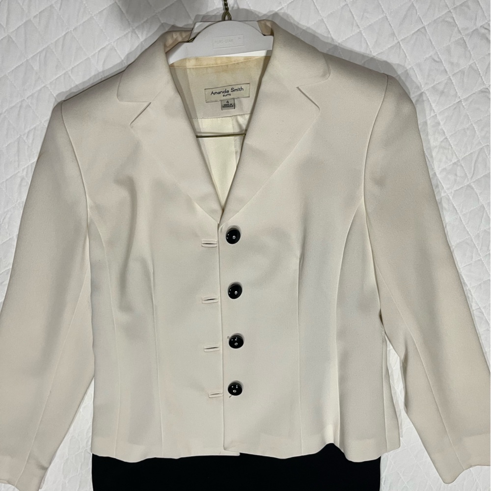 Three piece off White suit coat with black skirt and matching tank